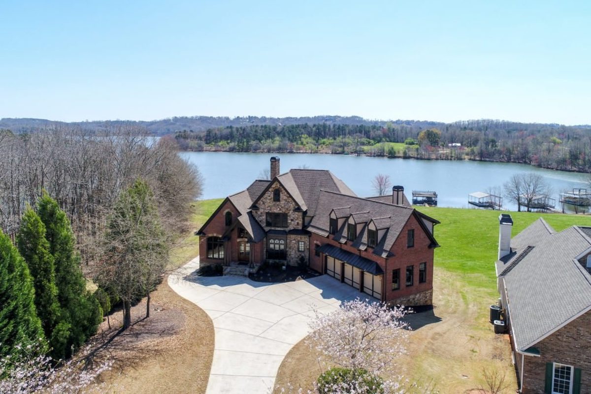 Brick estate with a private dock on Lake Lanier
